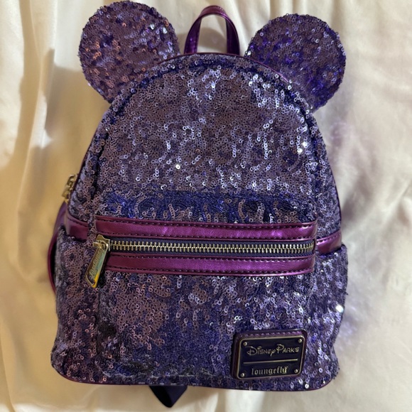 Loungefly Handbags - Loungefly Disney Parks Sparkling Purple Sequin Backpack